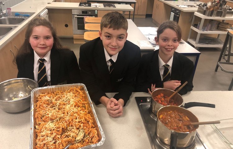 Image of Year 8 pupils cook for the homeless