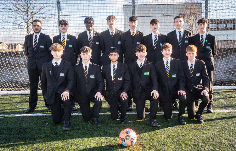 Image of Year 11 football team on target for the cup